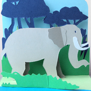 Craft you own pop up paper elephant card. This pattern is supplied as a PDF and includes colour print version plus B&W outlines. Create with the convenience of ready-to-go colour or use the vibrancy of your own coloured card to give your scene some additional pop. Detailed instructions are included and a construction guide video to help you towards success.